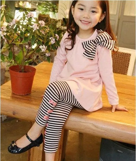 Girls cotton clothing set in pink colour showing complete coordinated outfit for sizes 110-140cm
