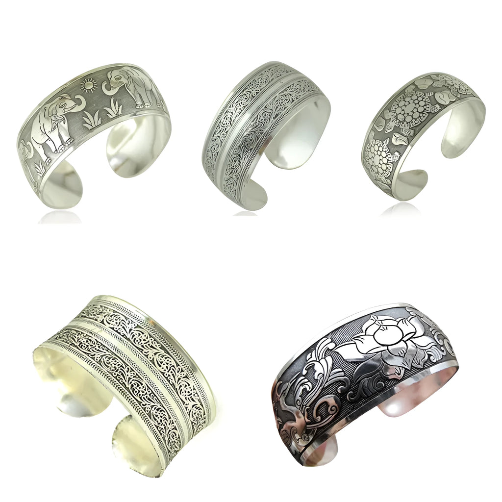 Open carved alloy bracelet with ethnic Miao-inspired patterns in adjustable design