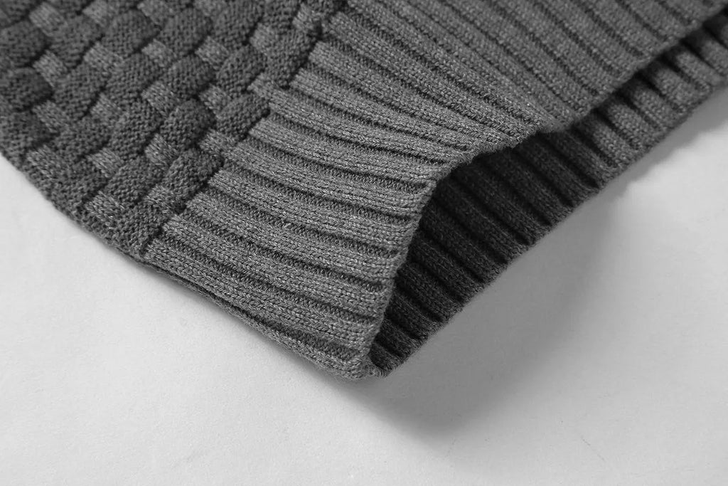Man wearing a grey cotton-polyester blend hooded sweatshirt, showcasing the casual hoodie design.