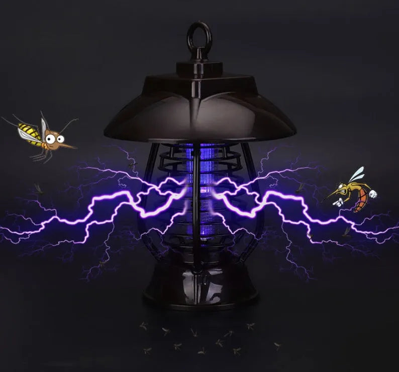 White solar-powered electronic mosquito lamp with solar panel and purple switch for garden outdoor use.