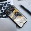 Samsung Galaxy phone case with marbled pattern in blue and gold colour variation