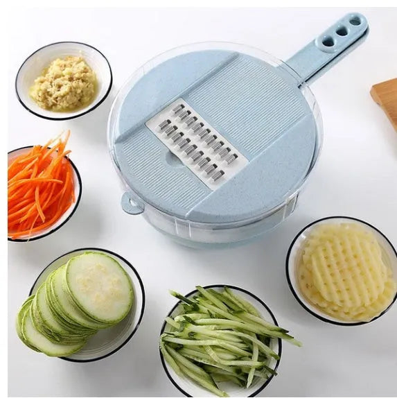 8-in-1 mandoline vegetable slicer with stainless steel blades and blue plastic body on kitchen counter