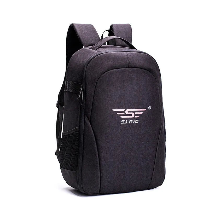 Black Oxford cloth drone backpack showing multiple internal compartments for camera and laptop storage