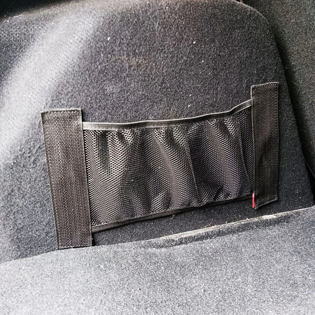 Elastic polyester car boot storage net shown with metal hooks and adhesive strips for organising loose items.