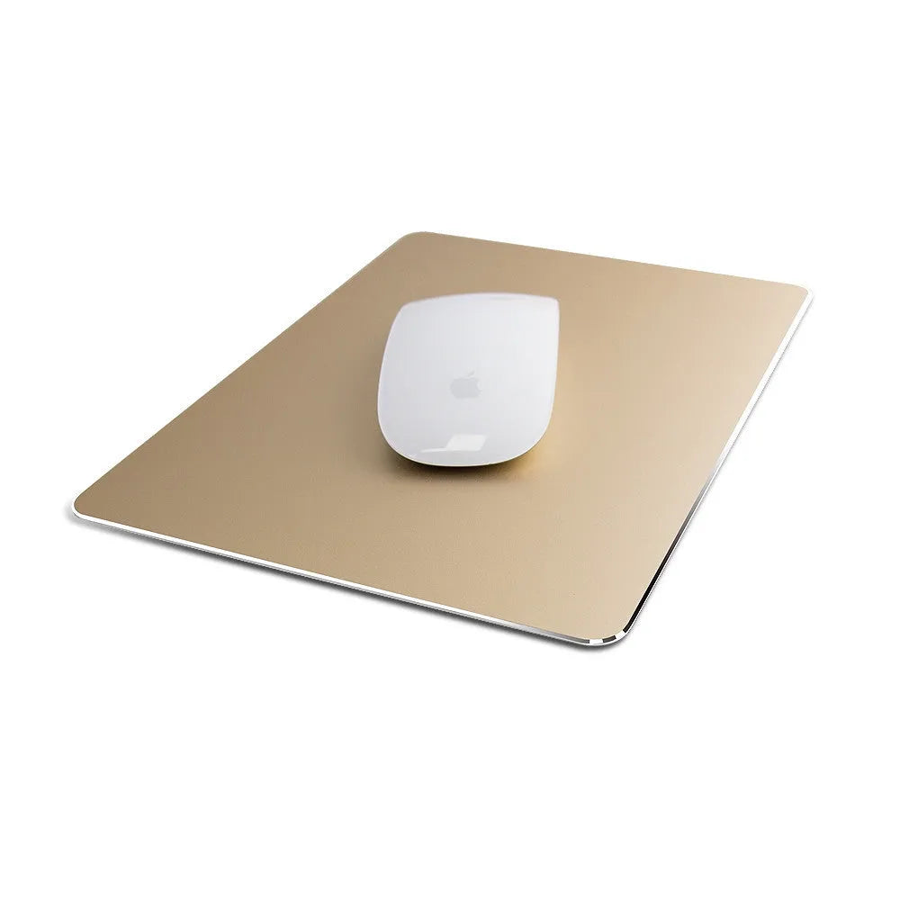 Double-sided aluminium mouse pad in Black on a desk, showing non-slip metal surface and compact size