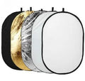 5-in-1 collapsible photography light reflector unfolded showing gold, silver, white, black, and translucent surfaces.