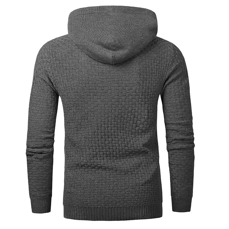 Man wearing a grey cotton-polyester blend hooded sweatshirt, showcasing the casual hoodie design.
