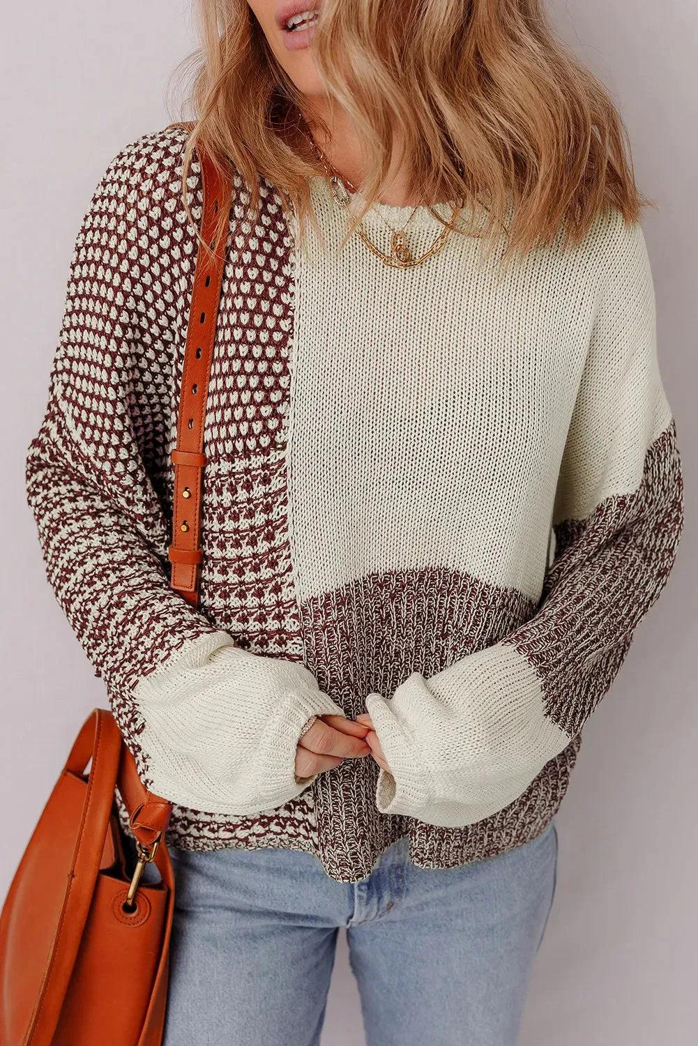 Dark khaki loose sweater with drop shoulders, colour block pattern, and a tie at the back.