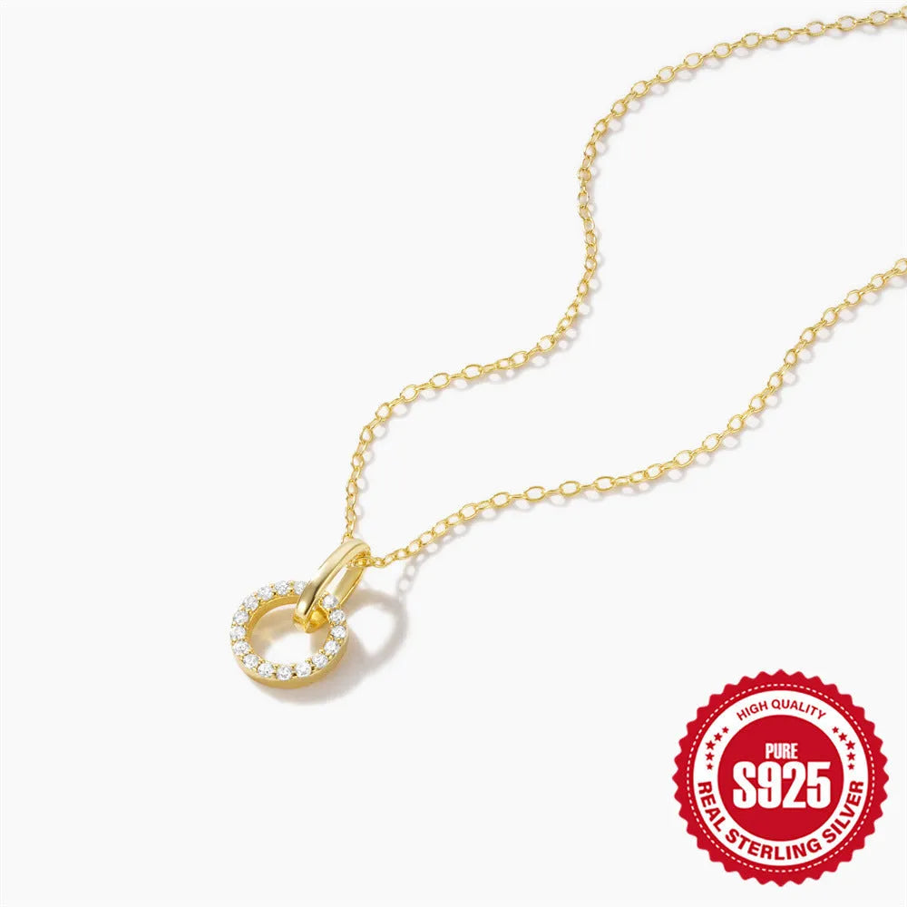Gold-coloured S925 sterling silver geometric pendant necklace on a model, showing adjustable clasp.