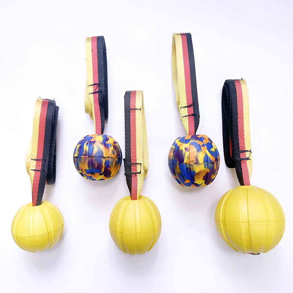 Yellow and camouflage EVA foam floating tetherball dog toys in 6.5cm, 7cm, and 9cm sizes.