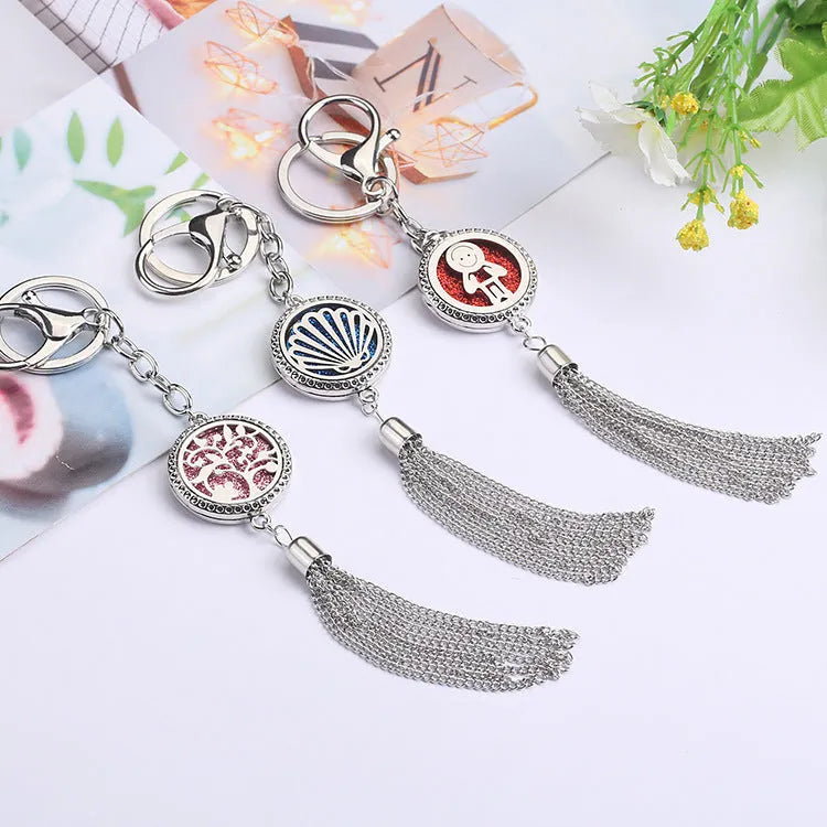 Alloy metal aromatherapy car pendant on a 50cm chain, showing 12mm round scent box, 28mm size.