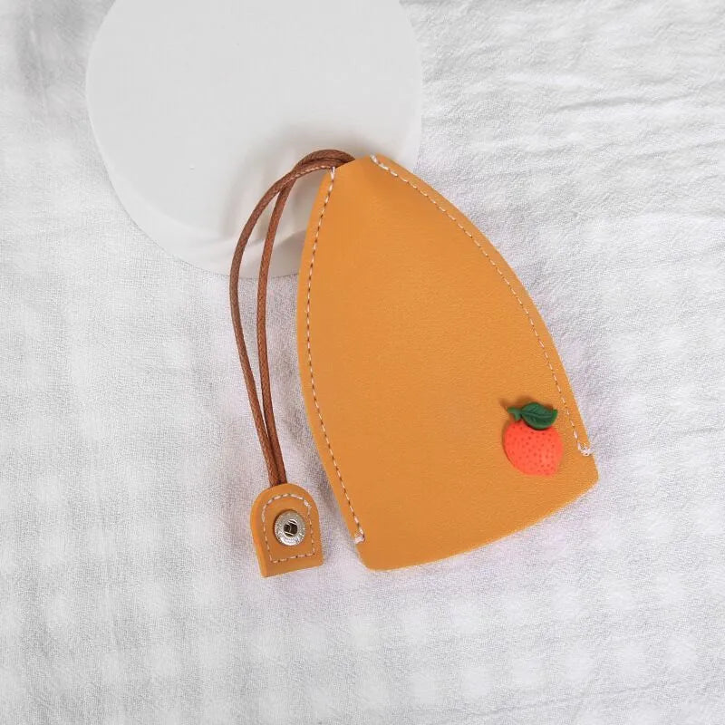 Cartoon style pull-out car key case made from PU leather in assorted designs