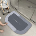 Blended material floor mat in blue colour with oval shape on bathroom floor