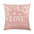 Square red and white plaid heart print Valentine's Day pillow cover on a cushion