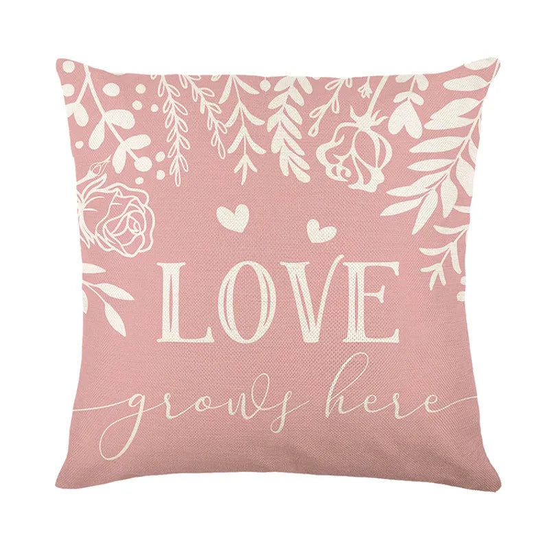 Square red and white plaid heart print Valentine's Day pillow cover on a cushion