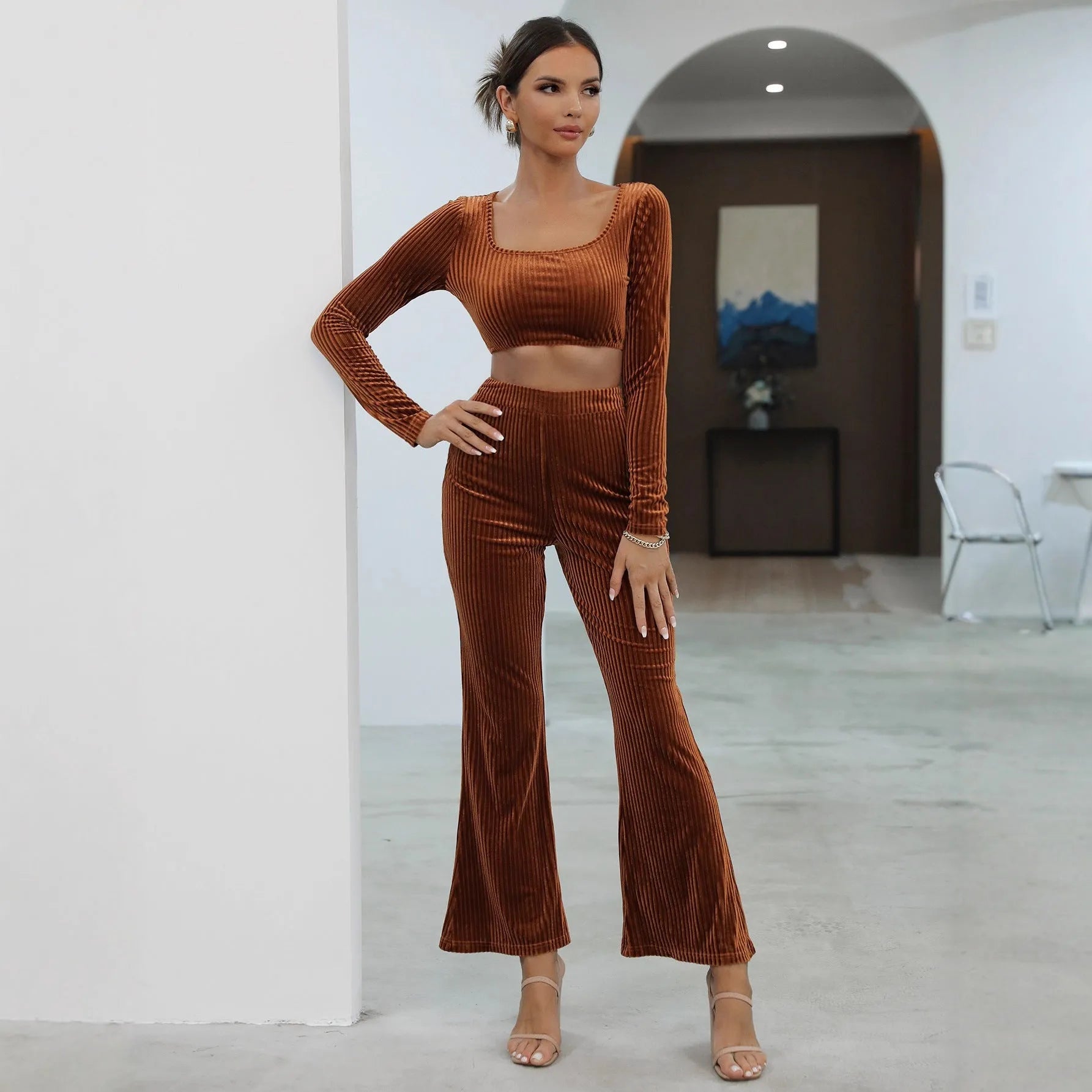 Caramel coloured long sleeve sweater and matching trousers casual set on hanger