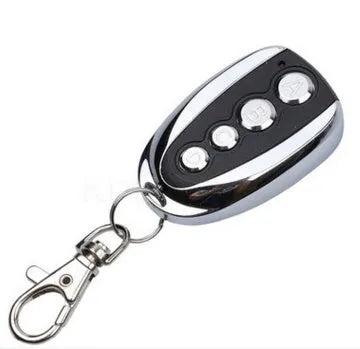 Wireless copy remote control with black metal shell and four buttons for self-learning of radio frequency signals.