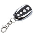Wireless copy remote control with black metal shell and four buttons for self-learning of radio frequency signals.