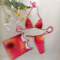Tie-dye pattern three-piece halter bikini swimwear set with skirt on hanger