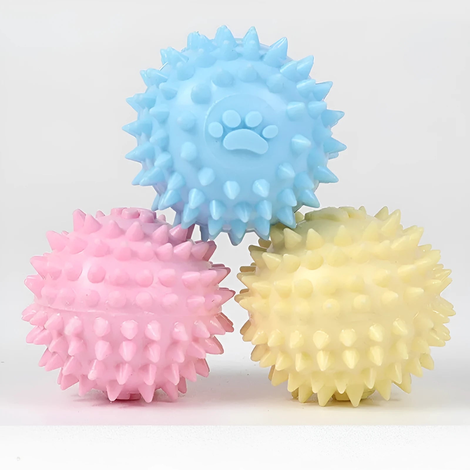 Blue TPR rubber dog chew toy with footprint texture for tooth cleaning, 6cm diameter