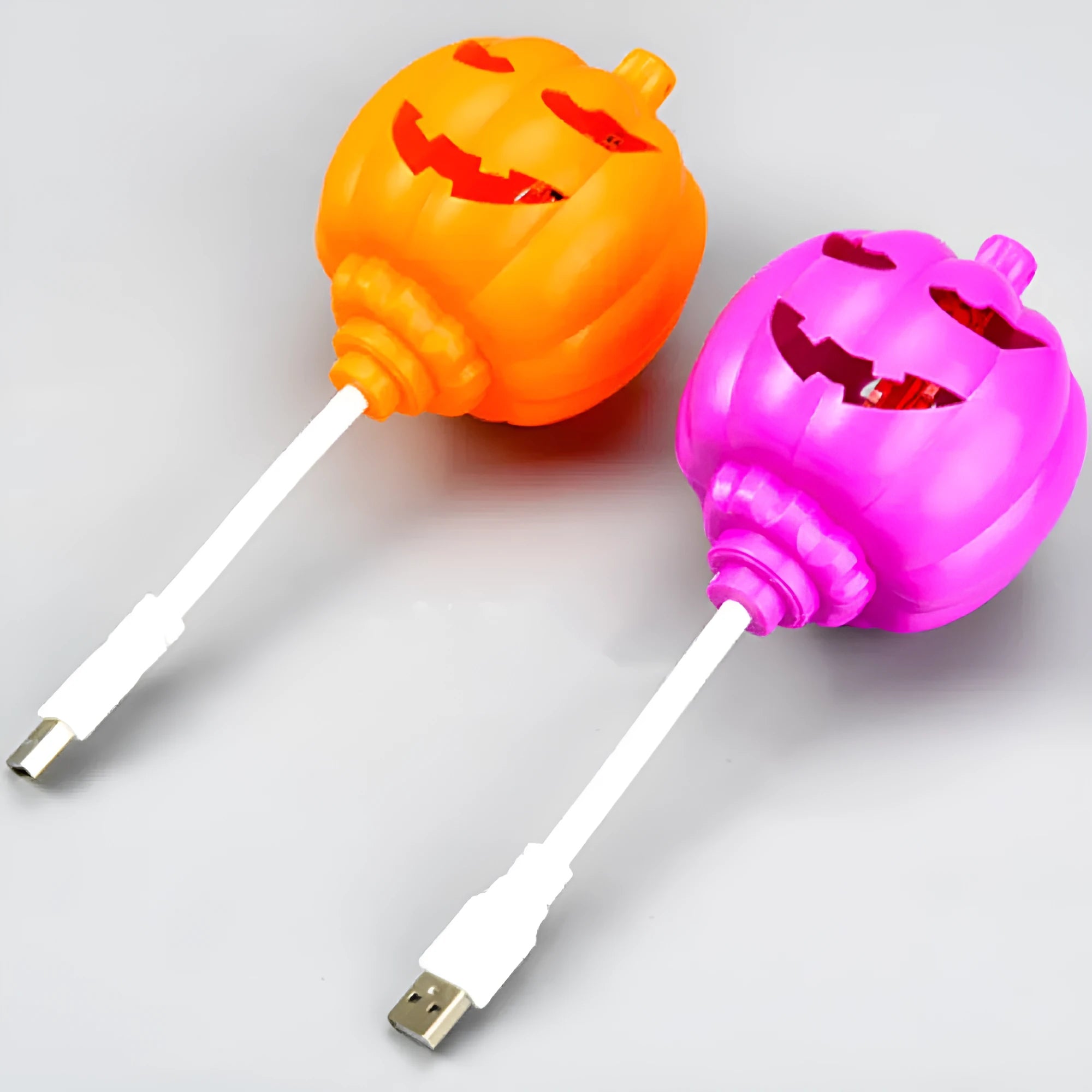 Pumpkin shaped USB rechargeable lamp with yellow or purple light options for holiday decoration