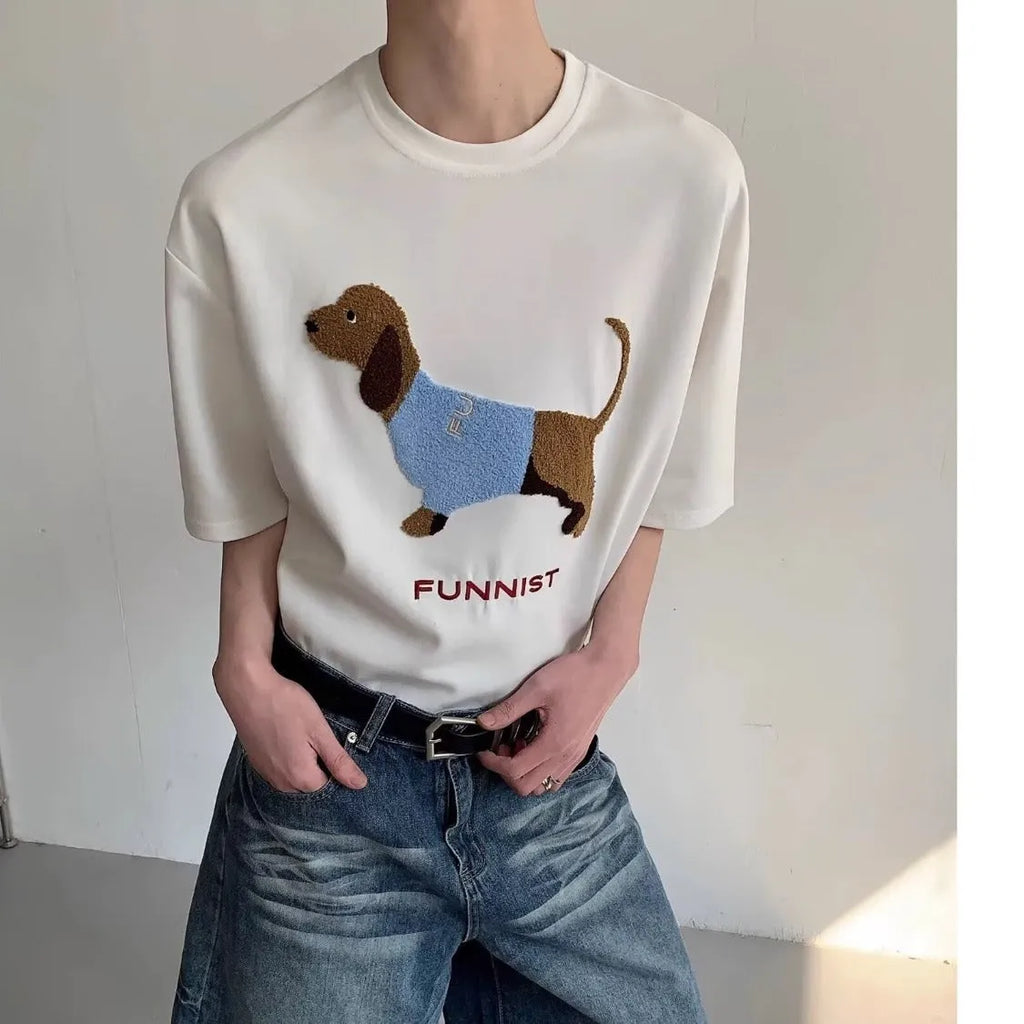 Grey men's round neck T-shirt with an embroidered brown sausage dog design on the front.