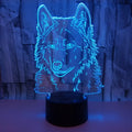 Wolf 3D lamp night light with touch and remote control on a bedside table