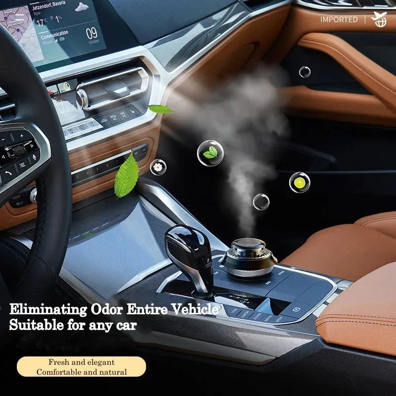 Solar-powered kinetic car air freshener with rotating double ring diffuser in black plastic