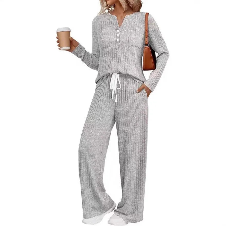 Women's V-neck striped knit long coat in light grey with long sleeves and pockets.