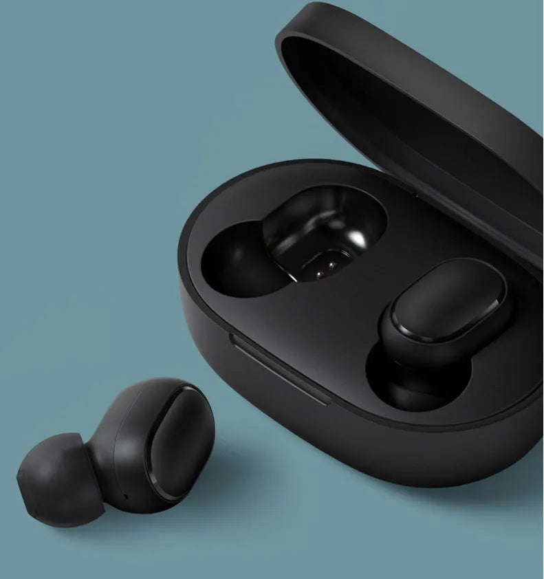 Redmi AirDots True Wireless black earbuds and charging case with three earplug sizes.