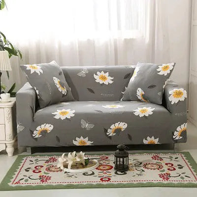 Geometric patterned stretch sofa slipcover fitted on a three-seater sofa in a living room.
