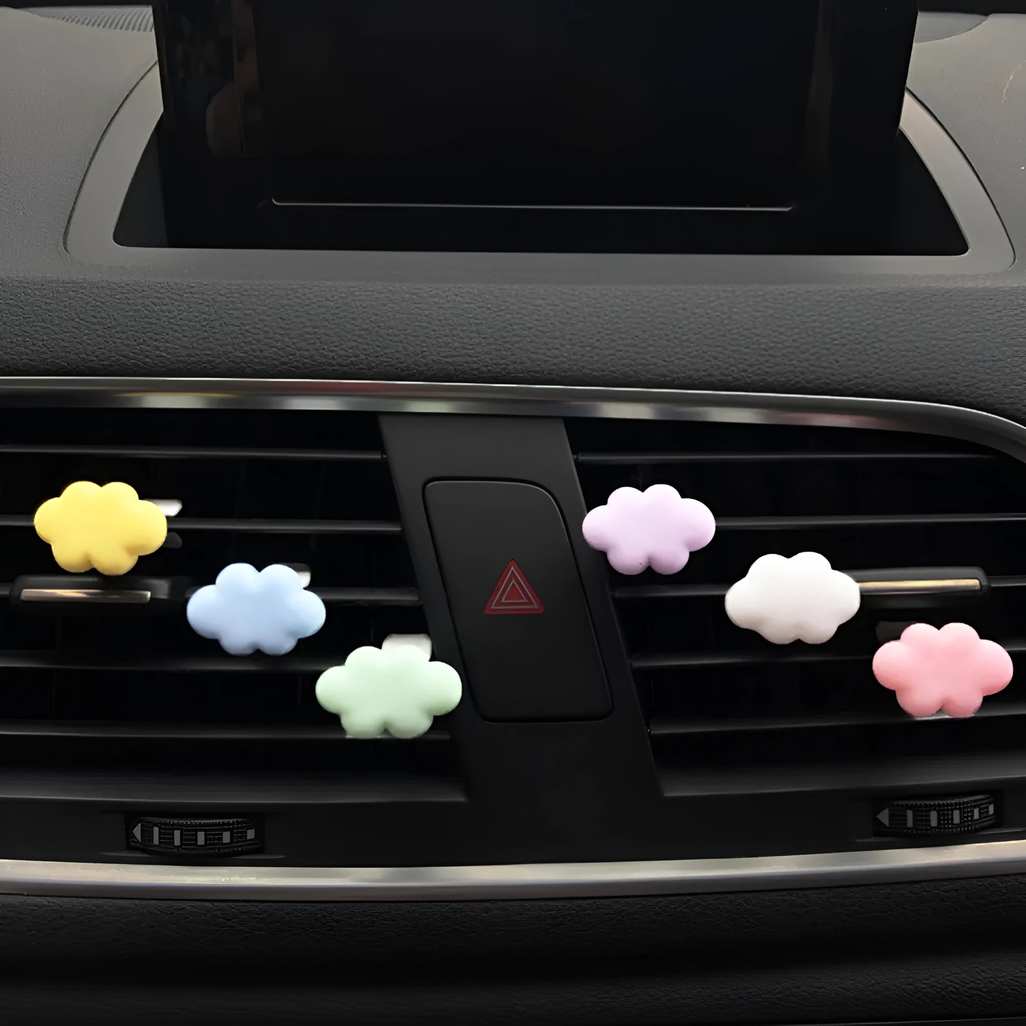 Resin Baiyun cloud cartoon car air freshener clip in pastel colours for vehicle vents.