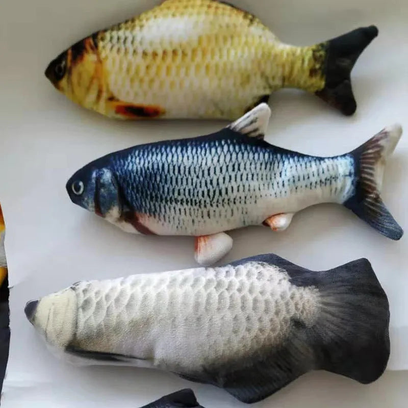 A multicolour electronic jumping fish cat toy measuring 30cm long with a USB charging cable.