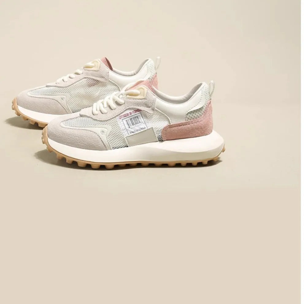 Women's low-top retro sneaker in grey with round toe, rubber sole, and shallow-cut design under 7cm.