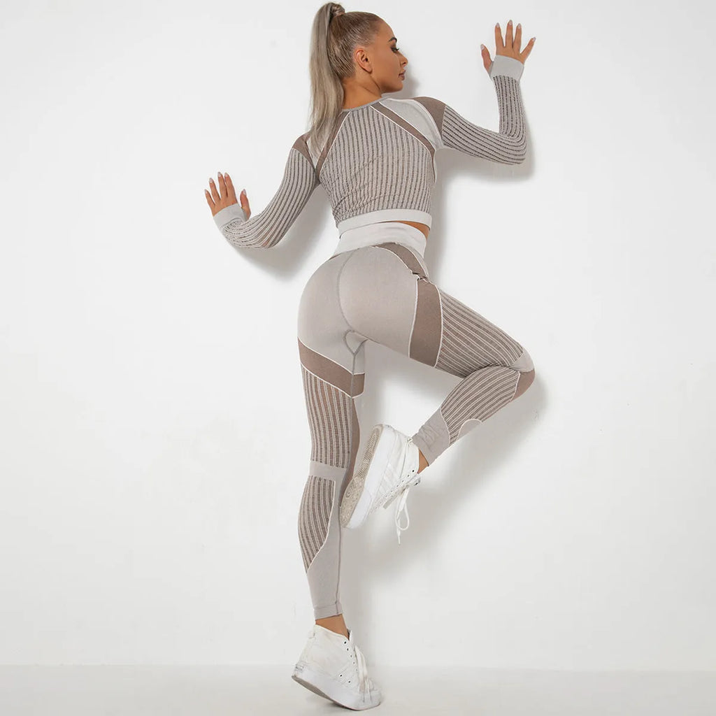 Women's seamless knitted long sleeve yoga wearsuit in a striped pattern, shown in a neutral colour.