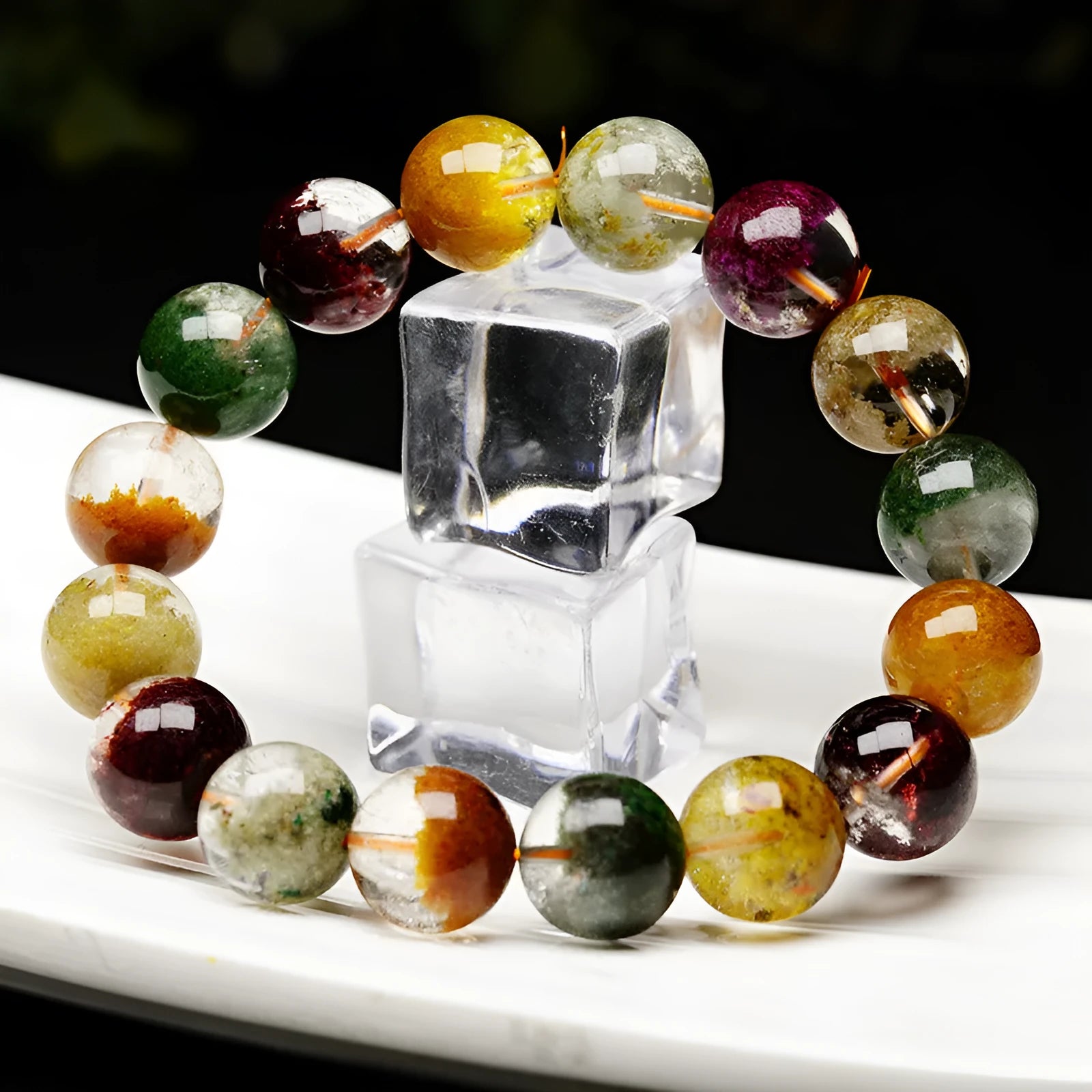 Ethnic style crystal bracelet with colourful ghost cornucopia beads, 10mm size, on an adjustable band.
