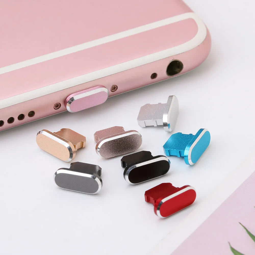 Aluminium alloy iPhone charging port dust plug shown in various colours including gold, silver, blue, and rose gold.