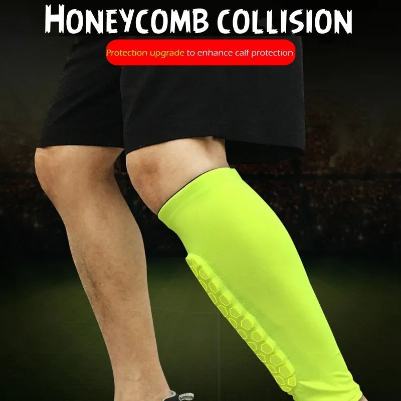 Black lycra football shin guard holder with silicone band on a leg showing secure fit