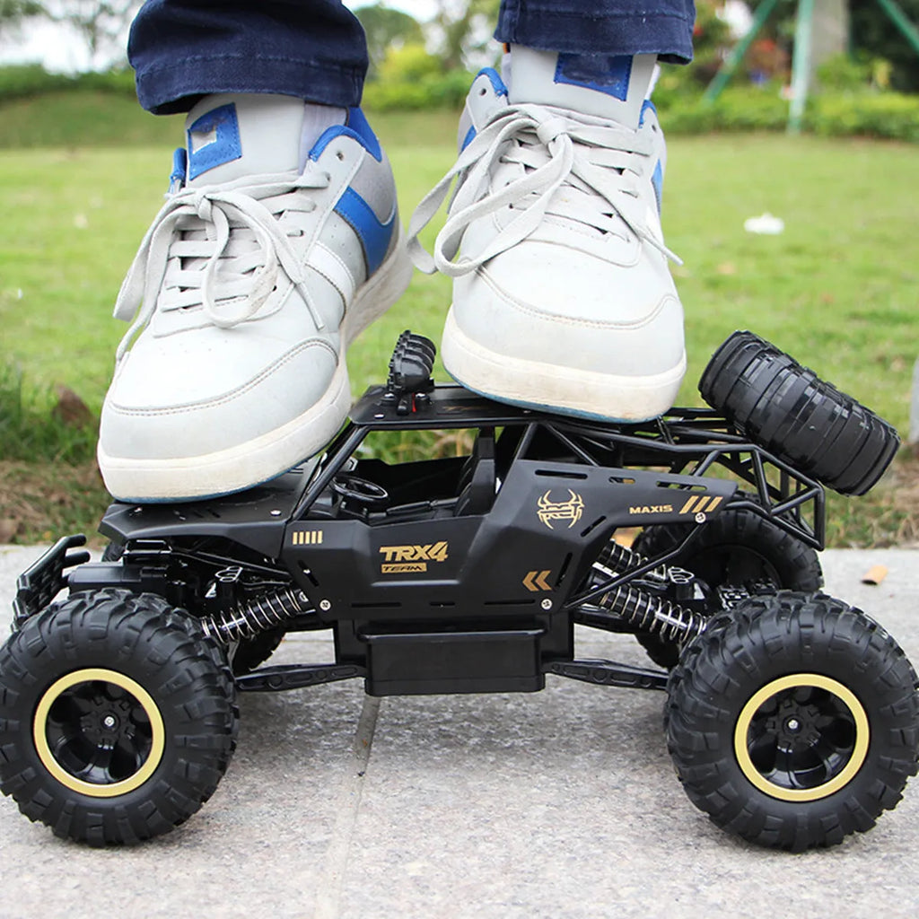 Black and silver remote control cars showcasing 28cm and 37cm four-wheel drive models with wireless controllers