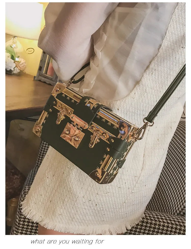 Hard PU leather women's flap handbag with single adjustable shoulder strap in black or green