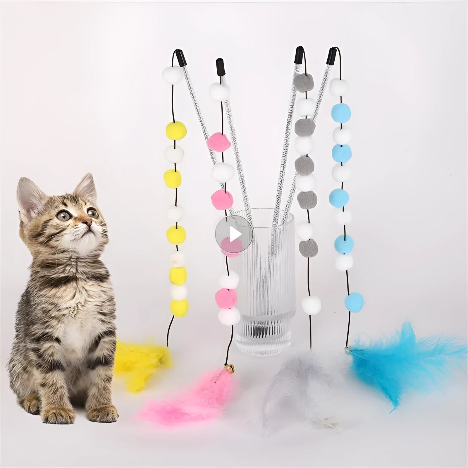 31cm long cat teaser rod with pompon feather and bell attachments in multiple colour options