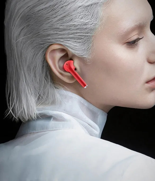 Lipstick-style wireless Bluetooth earphones with charging case in black, pink, purple, or white colours