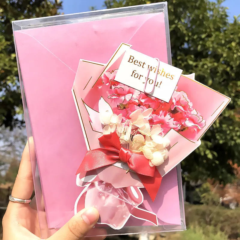 Handmade 3D butterfly-shaped birthday card with artificial flowers and hot foil stamping details.
