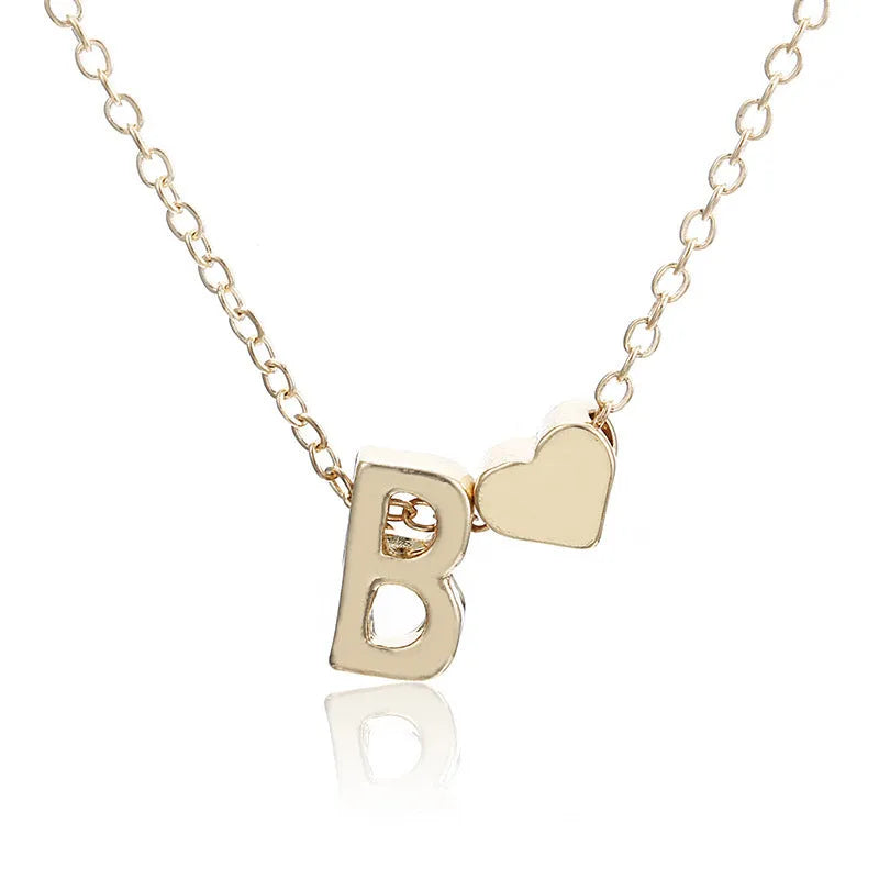 Peach-shaped alloy necklace pendant in a gold finish on a chain.