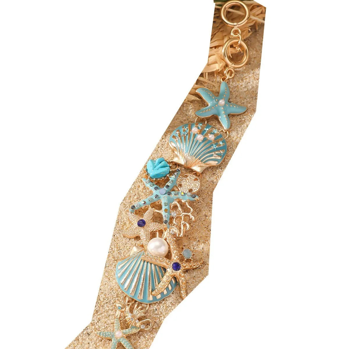 Alloy marine bracelet with boat anchor, star, and starfish rhinestone elements in turquoise, coral red, or coral blue