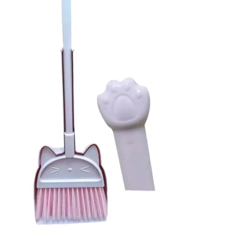 Purple plastic broom and dustpan set with a non-stick rotating brush holder