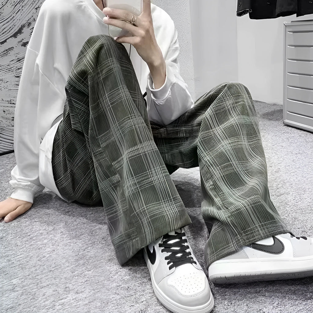 Men's black and green plaid pattern loose-fit straight-leg casual trousers on mid-waist
