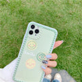 Green iPhone case with geometric polka dot frame and smiley face design for multiple iPhone models