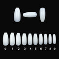 500 transparent and natural coloured ABS false nails in ten sizes, packaged in small bags.