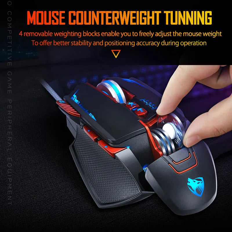 Thunder Wolf V9 wired gaming mouse in black or grey on a desk, showing six buttons and USB cable.